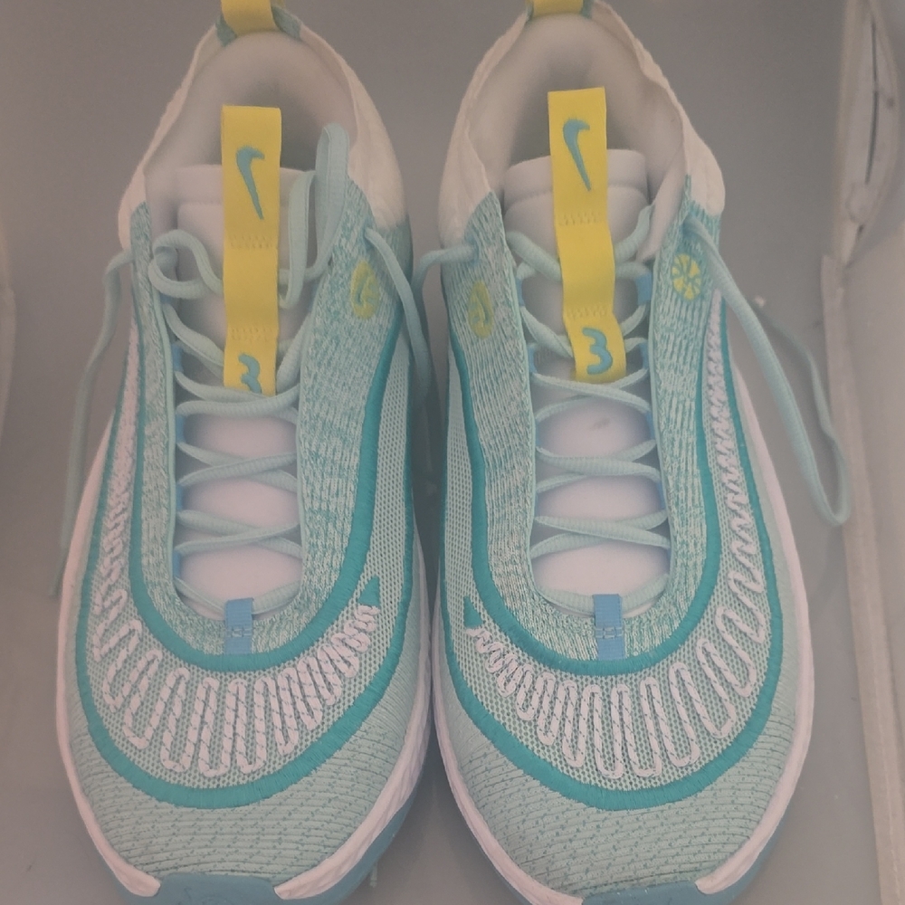 Nike Blue and Yellow Sneakers with Dynamic Design